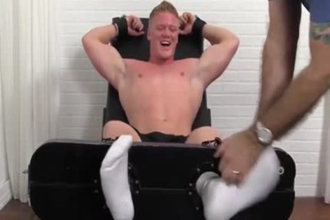 Hunky dude Seamus strapped And Tickled