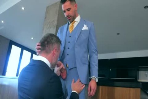 Plowed hard between wearing suit