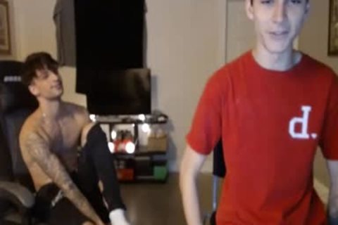 2 young males Caressing Their dicks