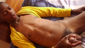 80 Gays: John jerking black cock in the bed